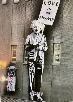 Print Of Einstein Holding A Peace Sign of Love Is The Answer