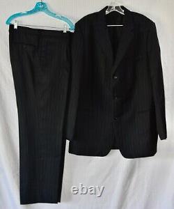 Patron par HUGO BOSS, costume veste et pantalon en laine à rayures fines Einstein Sigma, taille 46.